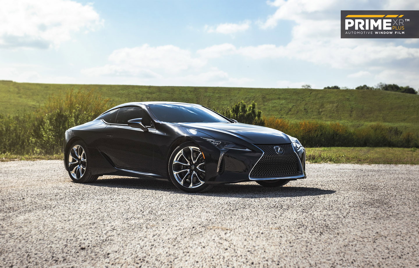 Freshly tinted black Lexus coupe