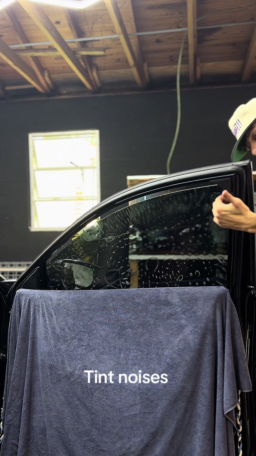 Window tint film being applied at Lightning Tint in Red Deer